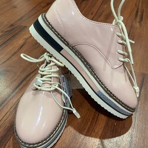 Light pink. Girl size 13 Patent leather shoe.